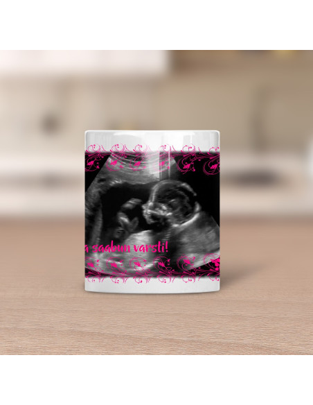 Must värvimuutev fototass BEEBITÜDRUK ON SAABUMAS